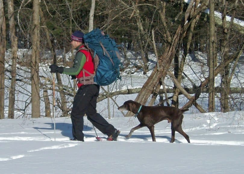 Man with winter backpack