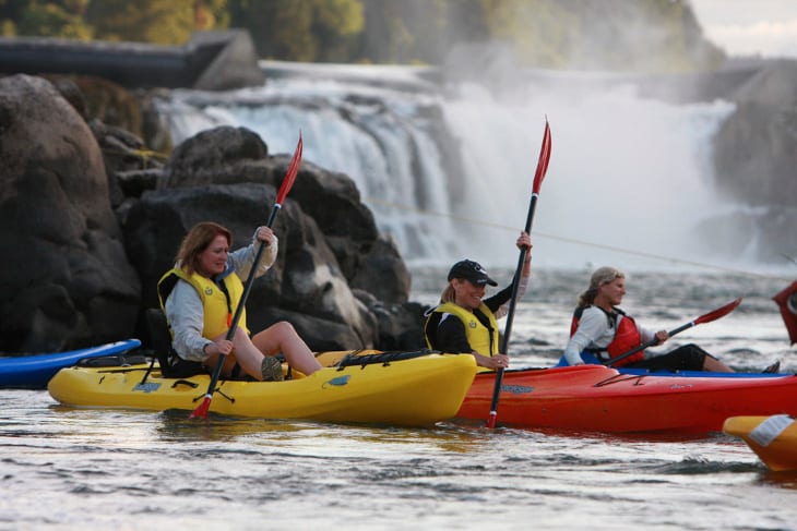 Kayaking with falls in background