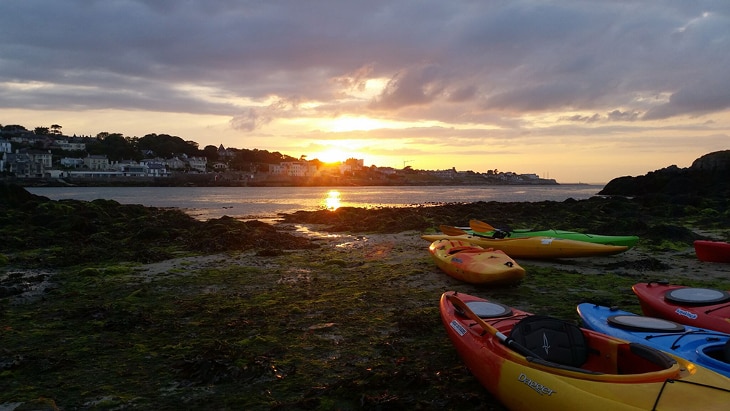 Kayaks under the sunset