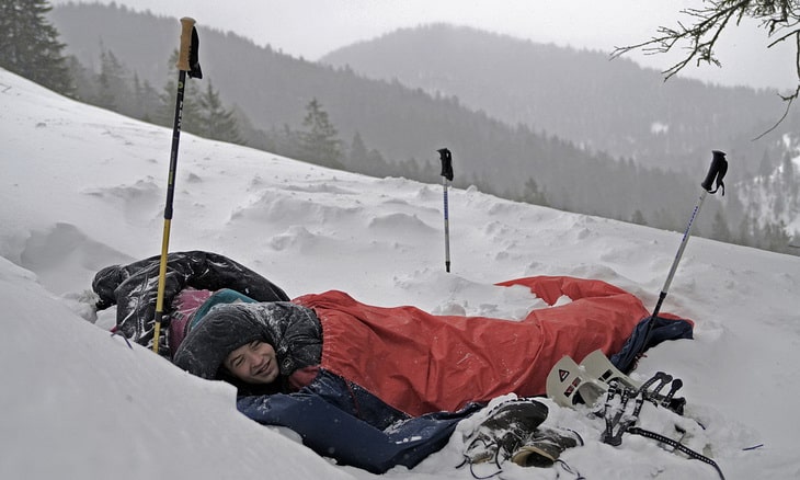 Person in a Bivouac Sacks during daytime
