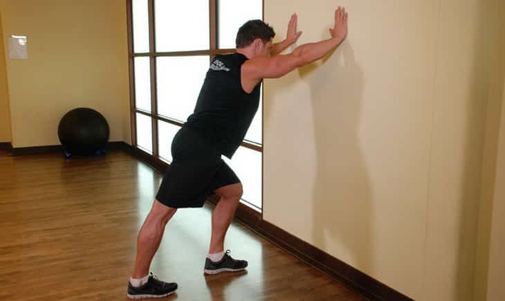 Man standing Calf stretches