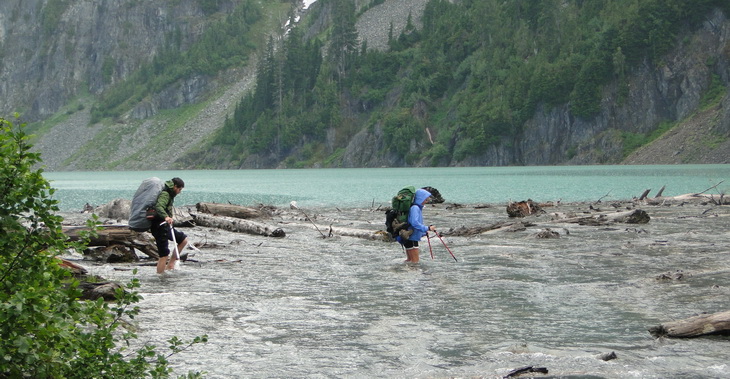 Fording the outlet of Blanca Lake, headwater North Fork Skykomish River.