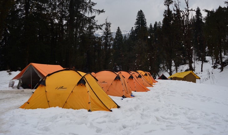 Group of tents in Kedarkantha in winter season