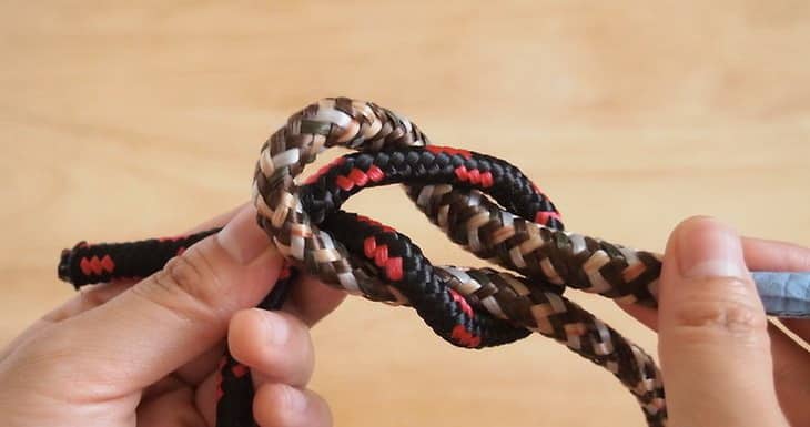 Man Tying a Square Knot