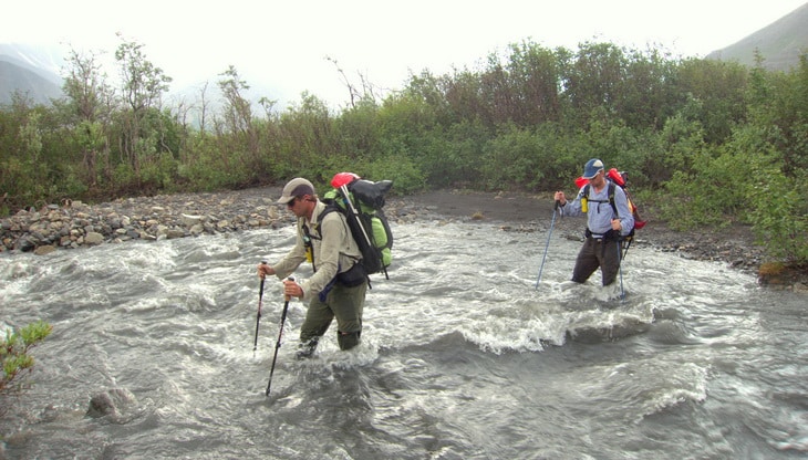 While fording this small but swift creek in Alaska, trekking poles provided two extra points of contact, and a way to test water depth.