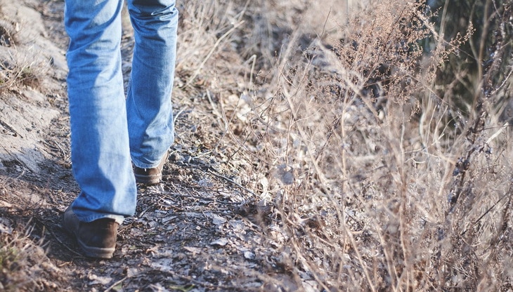 Man hiking 10 miles in jeans