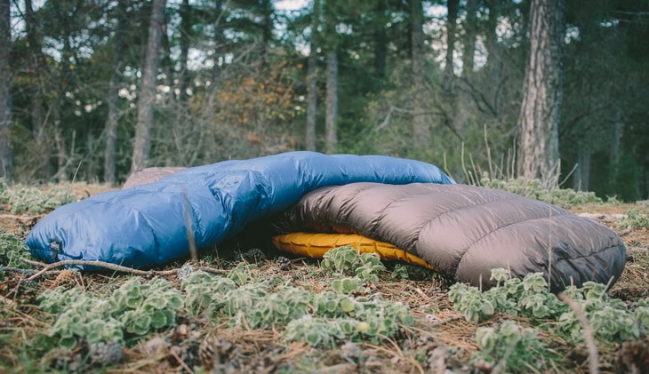 quilt-and-a-sleeping-bag on the grass