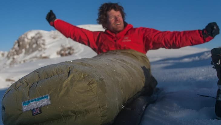 Man getting up in a Western Mountaineering Puma Gore WS Sleeping Bag