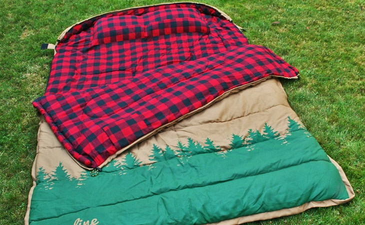 Rectangular sleeping bag on the grass