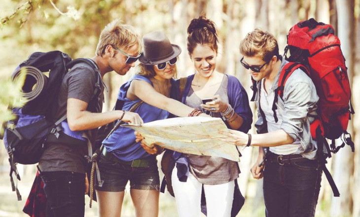 Backpackers looking at a map