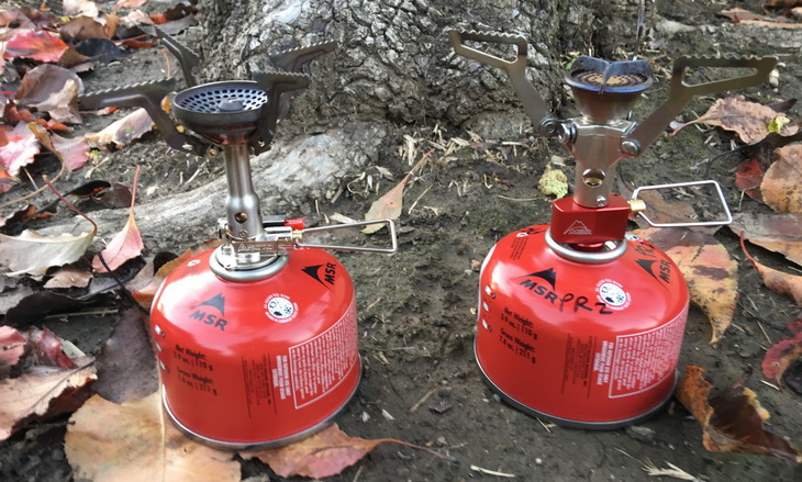Canister gas stoves on the ground