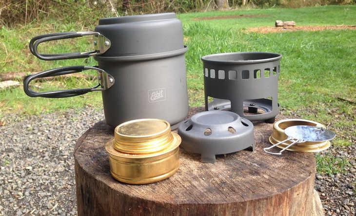 Someone preparing to cook with Esbit Alcohol Stove