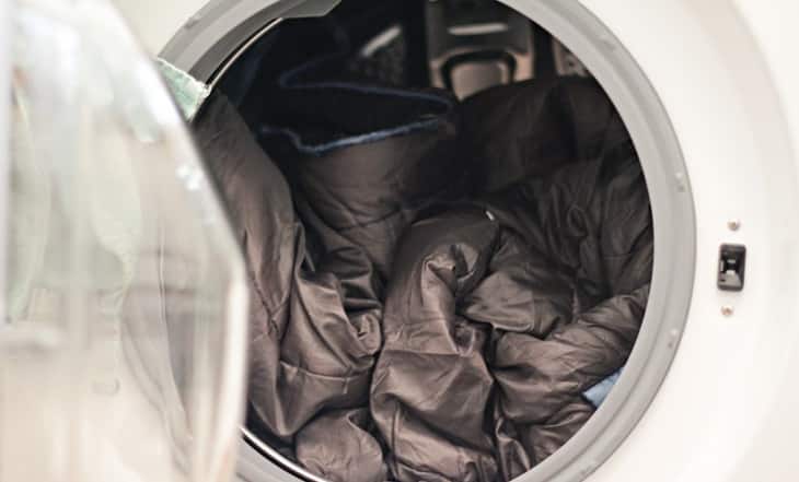 A sleeping bag in a washing machine