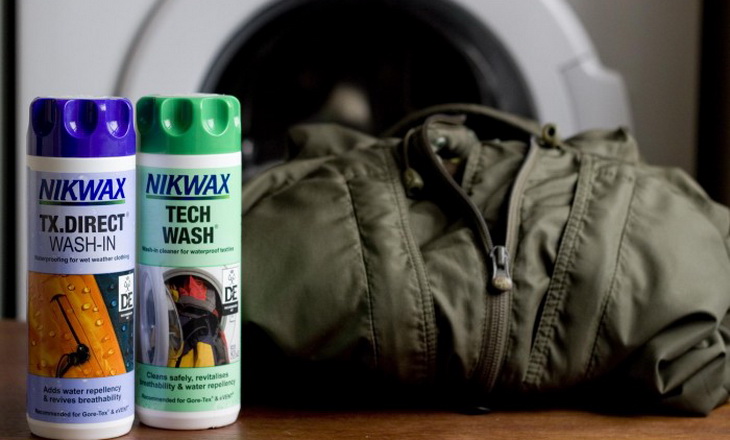 Nikwax product near a goretex jacket and a washig machine