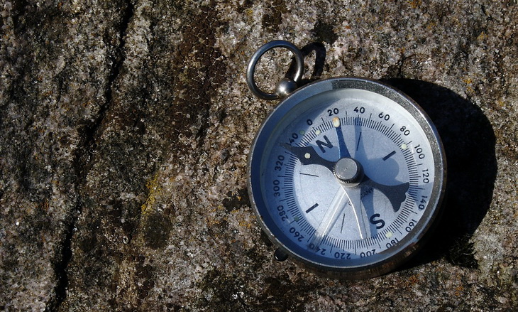 compass on a rock