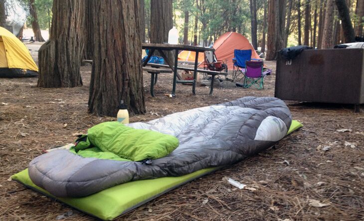 Nemo Women's Rhapsody sleeping bag on sleeping pad in the forest