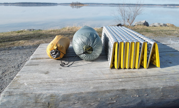 Therm-a-Rest Z Lite Sol Mattress on a wooden table near a water