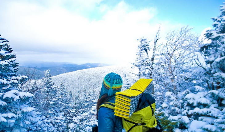 Therm-a-Rest Z Lite Sol Mattress attach to a backpack carried by a woman