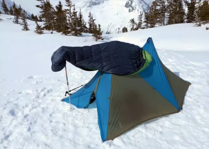 sleeping bag over tent