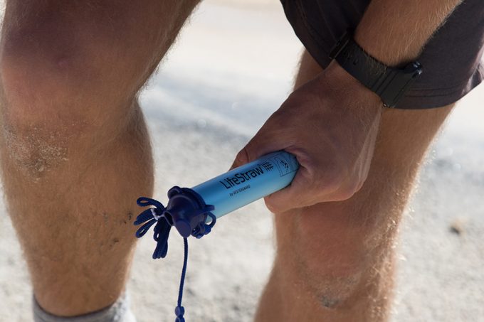 lifestraw in the hand of a hiker
