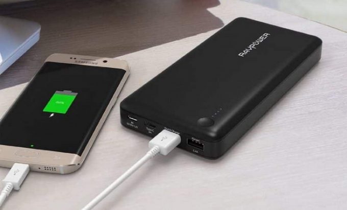 3-port external battery pack by ravpower on a table