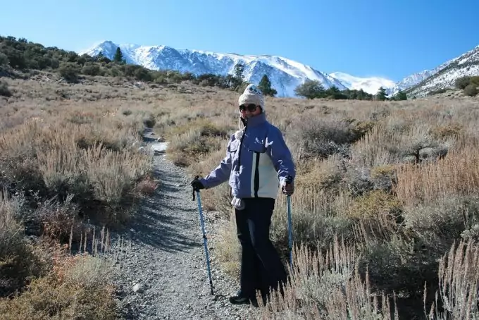 lady hiker with hiking poles
