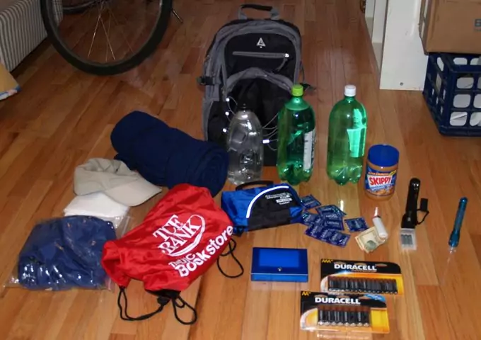 stuff laying on floor for bug out backpack