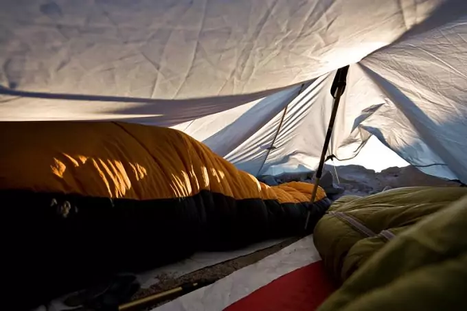 traditional sleeping bag in tent