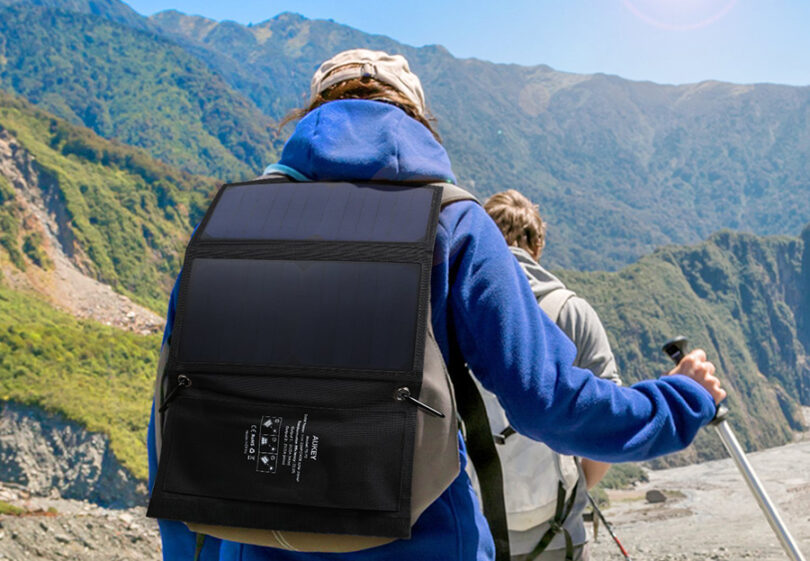hiker wearing solar charger on back
