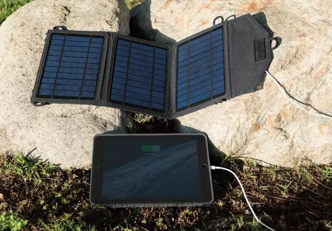 solar charger charging a tablet