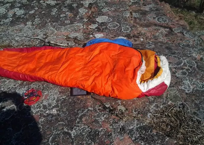 mummy sleeping bag on rocks