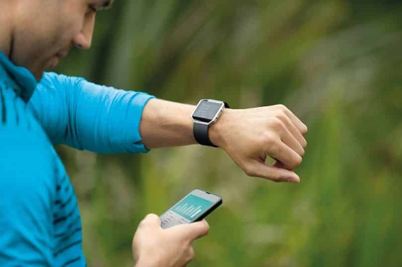 Man with activity tracker watch