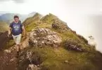 Chubby guy with hiking poles