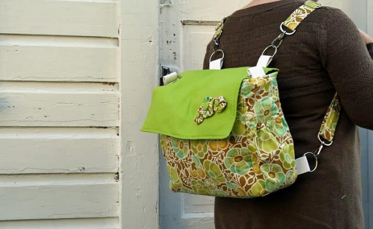 A woman with a convertible-diaper-bag
