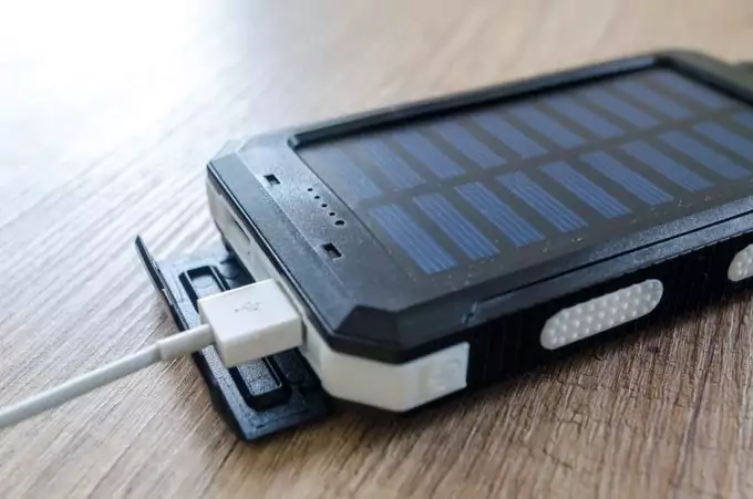 EXTERNAL BATTERY PACK being used with cable