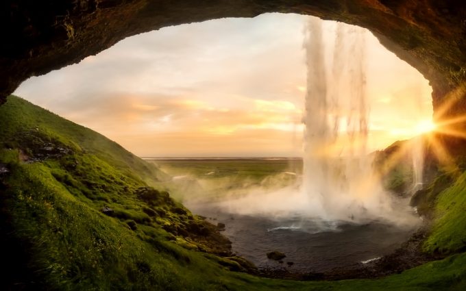 cave behind a waterfall