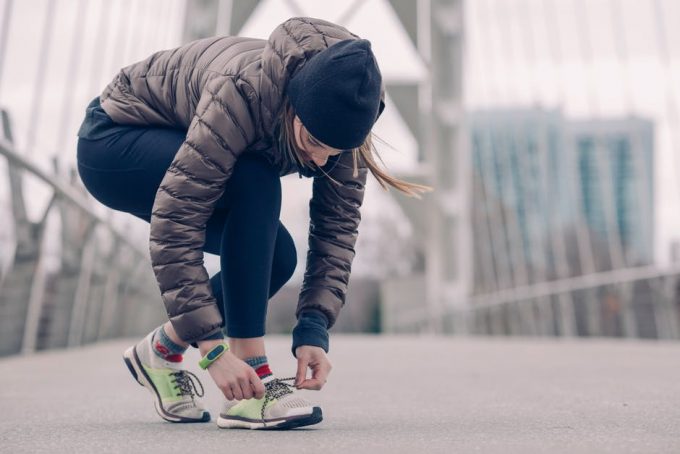 Woman tying her laces