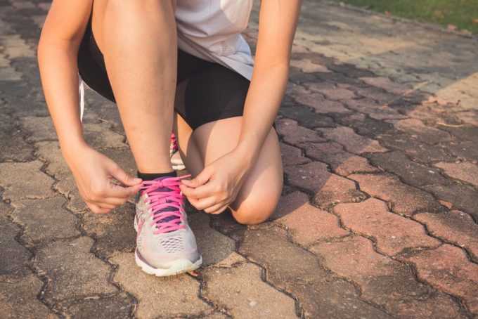 Woman tying her laces