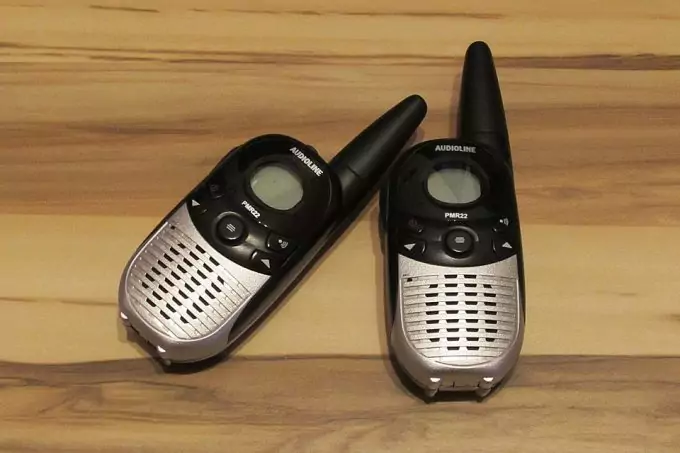 two walkie talkies next to each other