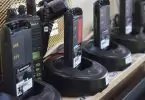 several brands of walkie talkies on shelf