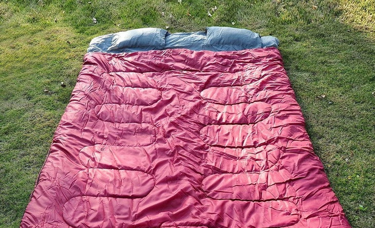 Double-Person-Sleeping-Bag-on the grass