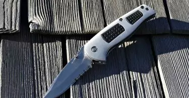 Sharp Metal folding Knife on table