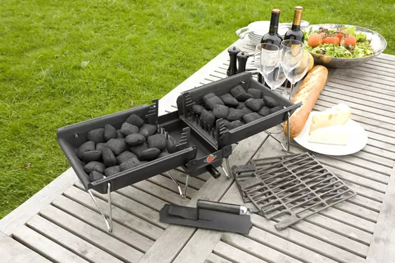 portable charcoal grill on table