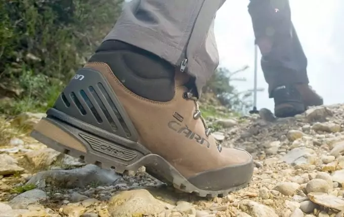 A man walking in a pair of hiking botts