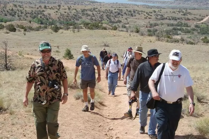 group of hikers wearing hats