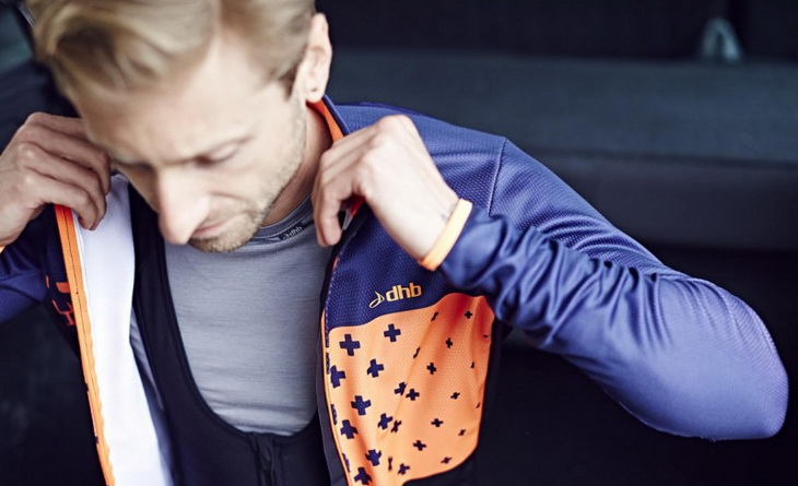 Man dressing a Merino wool base layers