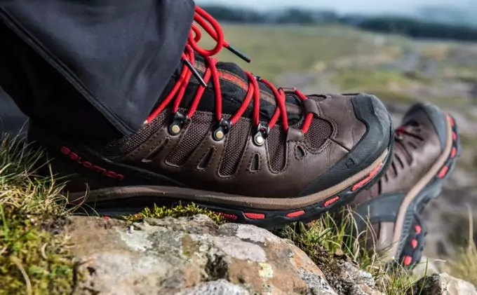 A man hiking in Salomon hiking boots