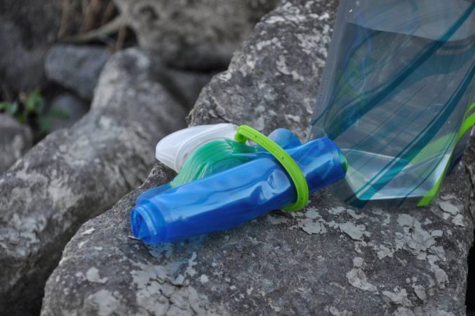 rolled up collapsible water bottle