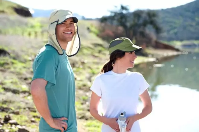 couple wearing hiking hats