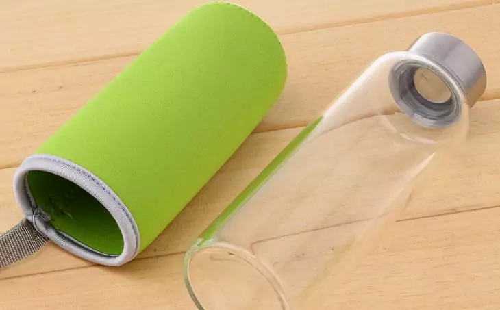 A glass-water-bottle on the table